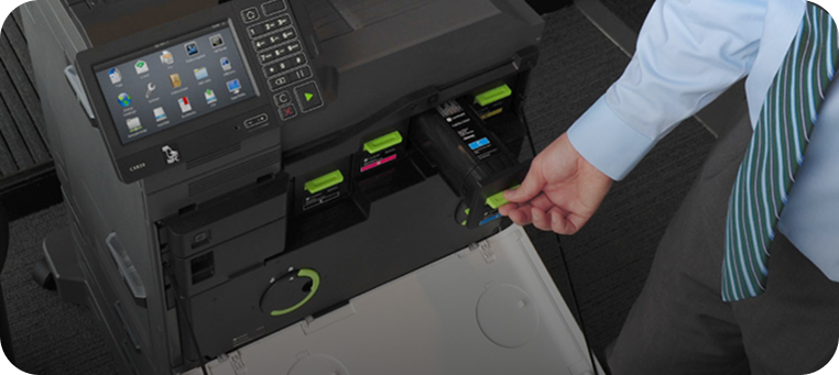 Person operating Lexmark printer with touchscreen