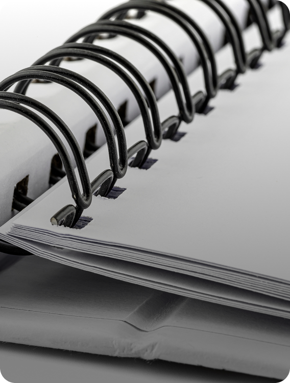 Close-up of a black spiral bound document
